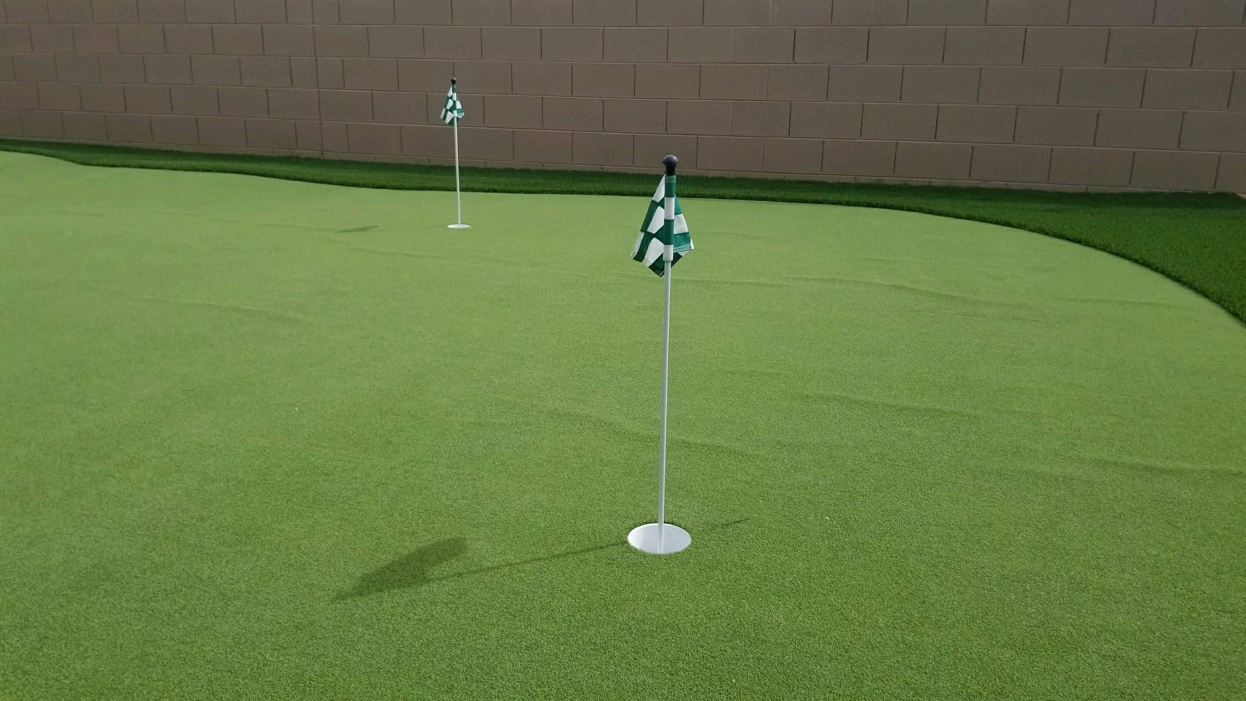 The Benefits of Installing a Custom Putting Green in Your Backyard